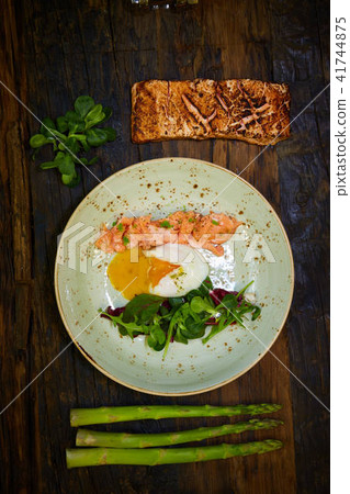 Slow Cooked Salmon fillet steak with salad on plate, Sous-Vide Cooking Salmon Fish Slow Cooked Salmon fillet steak with salad on plate, Sous-Vide Cooking Salmon Fish 41744875