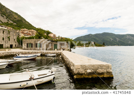 Romantic Mediterranean cloudly landscape. Montenegro, view of Bay of Kotor. Romantic Mediterranean cloudly landscape. Montenegro, view of Bay of Kotor. 41745848