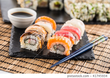 Set of roll sushi gold california with chopsticks 41745934