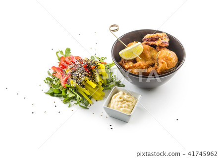 Fried vegetable pieces with sauce and vegetable Fried vegetable pieces with sauce and vegetable 41745962