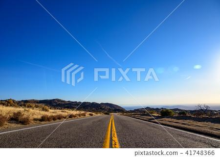 A straight single road in the Americas 41748366