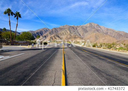 A straight single road in the Americas 41748372