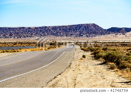 A straight single road in the Americas 41748739