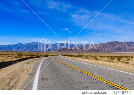 A straight single road in the Americas 41748744