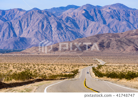 A straight single road in the Americas 41748747