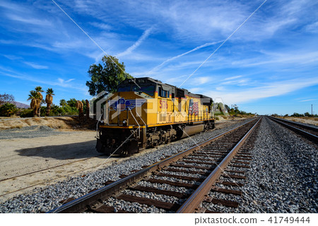 Locomotives and rails of long-distance freight trains crossing the Americas Locomotives and rails of long-distance freight trains crossing the Americas 41749444