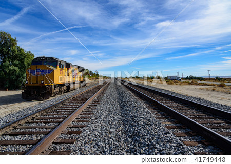 Long distance cargo train crossing the Americas Union Pacific Long distance cargo train crossing the Americas Union Pacific 41749448