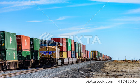 Container of long-haul freight trains crossing the Americas Container of long-haul freight trains crossing the Americas 41749530