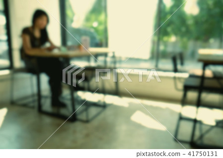 Coffee shop blur background with bokeh light 41750131