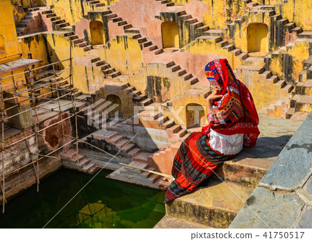 Old ancient deep well with lots of steps 41750517