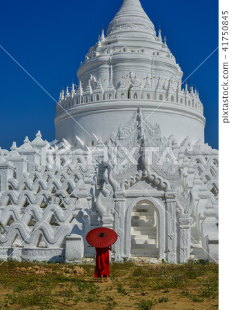 A Buddhist novice monk at white temple 41750845