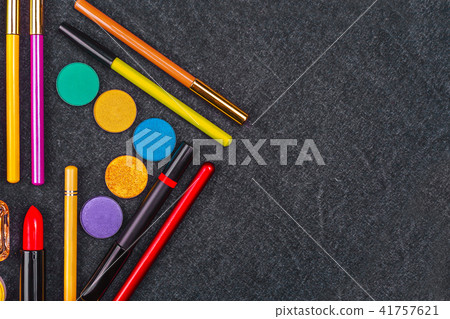 decorative cosmetics laying in a form of triangle decorative cosmetics laying in a form of triangle 41757621