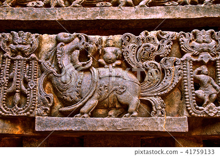 Sculptures at the base of Hoysaleshwara temple 41759133