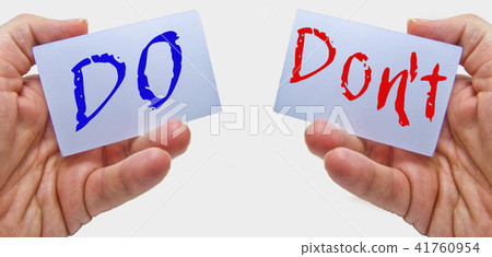 do and don't words hold on business man hands 41760954