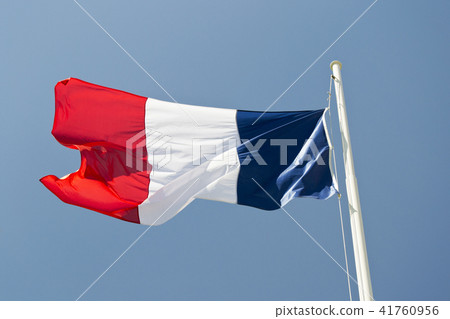 French flag waving in the wind with blue sky French flag waving in the wind with blue sky 41760956