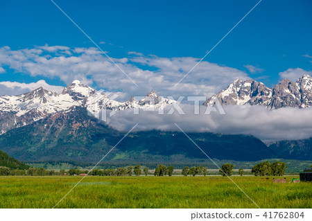 Grand Teton Mountains with low clouds Grand Teton Mountains with low clouds 41762804