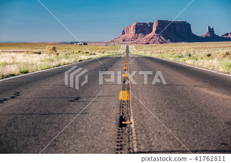 Empty scenic highway in Monument Valley Empty scenic highway in Monument Valley 41762811
