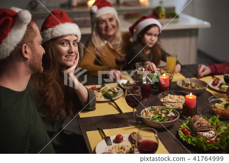 Happy woman among family on Christmas 41764999