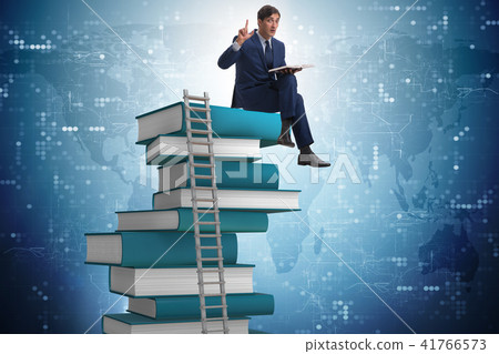 Businessman in education and learning concept Businessman in education and learning concept 41766573