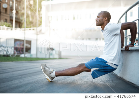 Outgoing man preparing for training Outgoing man preparing for training 41766574