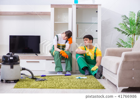 Cleaning professional contractors working at house 41766986