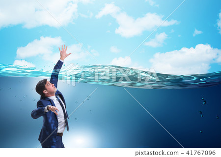 Drowning businessman in insolvency and bankruptcy concept 41767096