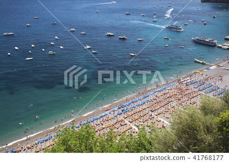 Beach umbrella and blue sea 41768177
