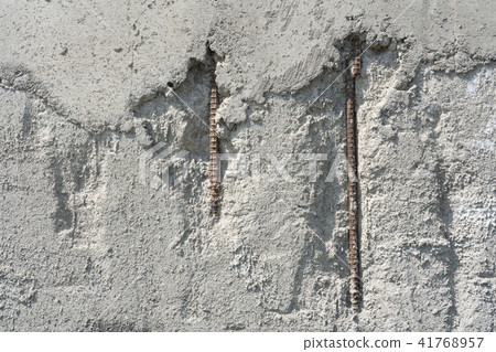Deteriorated concrete wall 41768957