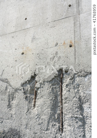 Deteriorated concrete wall 41768959