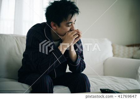 Middle-aged man in poor physical condition pajamas 41769647