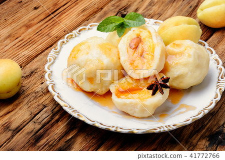 Dumplings with apricot and spicy syrup Dumplings with apricot and spicy syrup 41772766