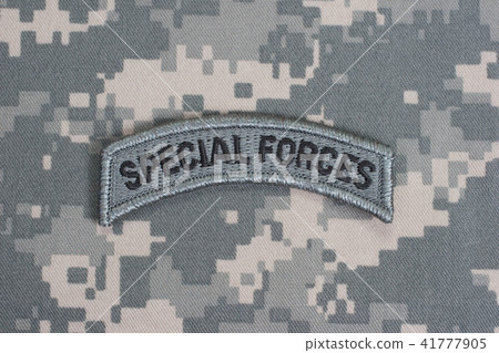 US ARMY special forces tab on camouflage uniform US ARMY special forces tab on camouflage uniform 41777905