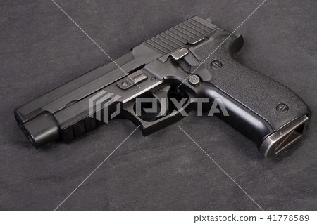 hand gun on black 41778589