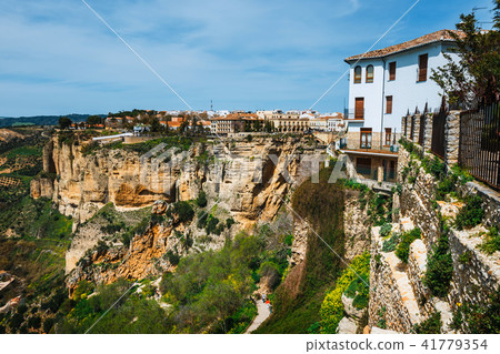 stone bridge in historic district of Ronda, Spain 41779354