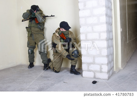 mercenary with AK-47 rifle mercenary with AK-47 rifle 41780783