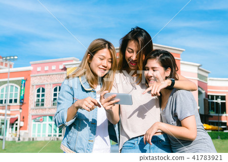 Asian Women selfie themselves after shopping. Asian Women selfie themselves after shopping. 41783921