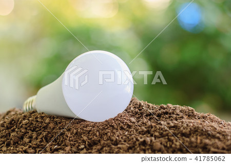 LED light bulb on soil 41785062
