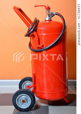 Red fire extinguisher 41786635