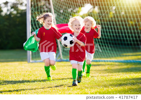 Portugal football fan kids. Children play soccer. 41787417