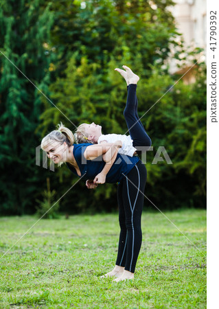 Sporty mother and daughter training Sporty mother and daughter training 41790392