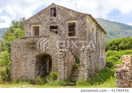 Ancient house built with concrete. Flowering 41790456