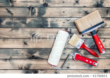 House painter, work tools on yellow background House painter, work tools on yellow background 41790601