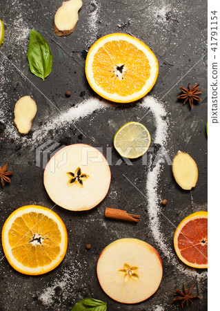 Flat lay of round slices of fruits Flat lay of round slices of fruits 41791154