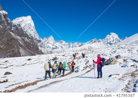 trekker are trekking on the snow mountain trekker are trekking on the snow mountain 41795307
