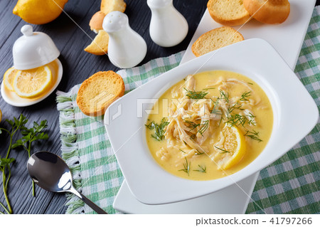 creamy summer greek chicken soup, close-up creamy summer greek chicken soup, close-up 41797266