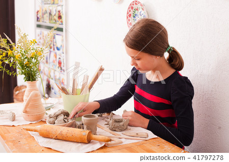 Child hands with plasticine Child hands with plasticine 41797278