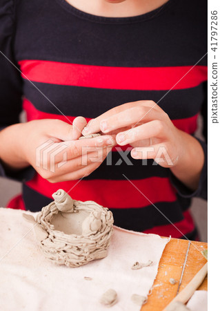 Child hands with plasticine Child hands with plasticine 41797286