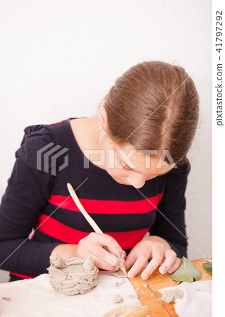 Child hands with plasticine Child hands with plasticine 41797292