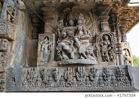 Shiva-Parvati. Hoysaleshwara temple, Halebidu Shiva-Parvati. Hoysaleshwara temple, Halebidu 41797384