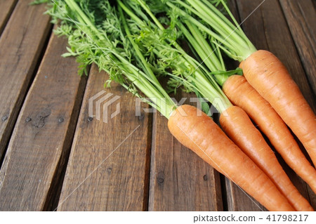 Fresh Hokkaido carrots with leaves Fresh Hokkaido carrots with leaves 41798217